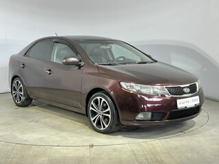 2010 Kia Cerato 5-speed II, красный, 620000 рублей, вид 4