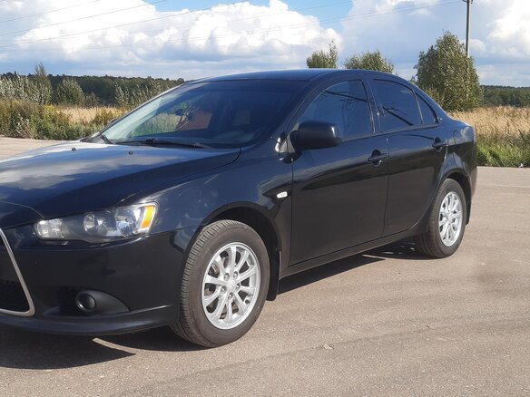2012 Mitsubishi Lancer X Рестайлинг, чёрный, 1050000 рублей - вид 5