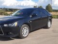 2012 Mitsubishi Lancer X Рестайлинг, чёрный, 1050000 рублей - вид 5