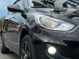 2011 Hyundai Solaris I, чёрный, 719000 рублей, вид 2