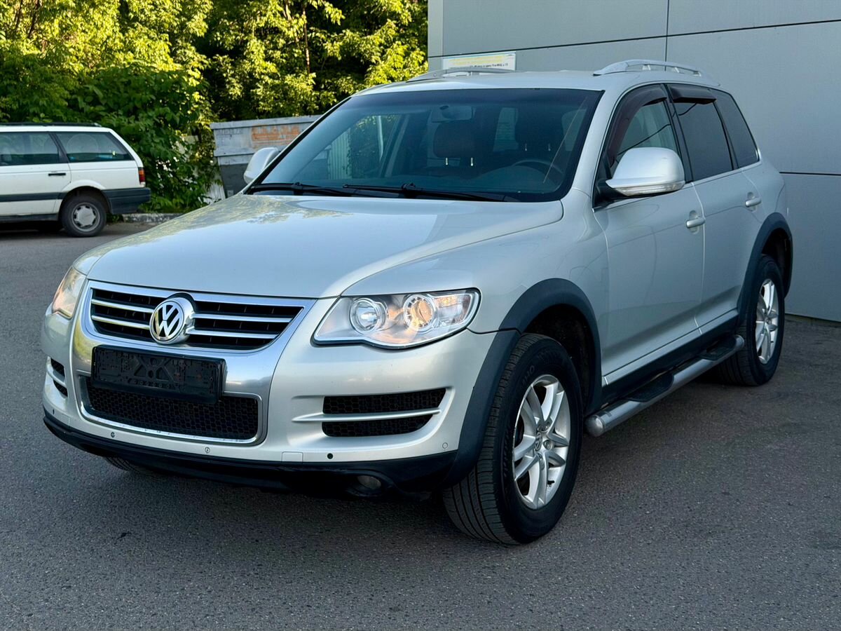 Открыть фотографии: Volkswagen Touareg I Рестайлинг