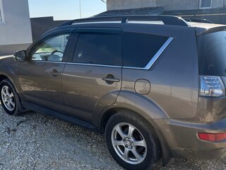 2011 Mitsubishi Outlander II Рестайлинг, коричневый, 1500000 рублей, вид 4