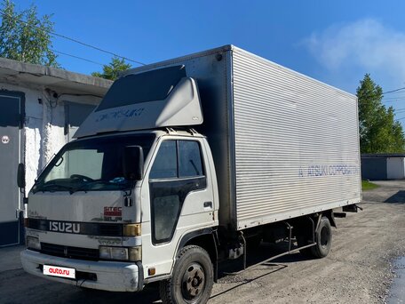 1992 Isuzu Elf (N-series), белый, 599000 рублей, вид 4