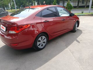 2014 Hyundai Solaris I, красный, 775000 рублей, вид 3