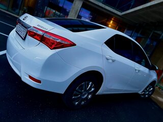 2015 Toyota Corolla XI (E160, E170, E180), белый, 1450000 рублей, вид 3