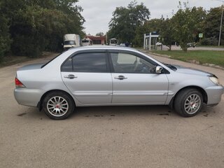 2007 Mitsubishi Lancer IX Рестайлинг, серебристый, 480000 рублей, вид 2