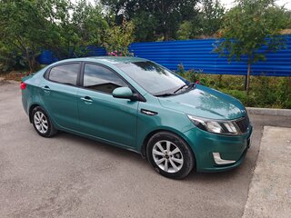 2012 Kia Rio 5-speed III, зелёный, 650000 рублей, вид 4