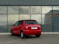 2010 Skoda Fabia II Рестайлинг, красный - вид 4