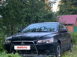 2011 Mitsubishi Lancer X Рестайлинг, чёрный, 600000 рублей, вид 1