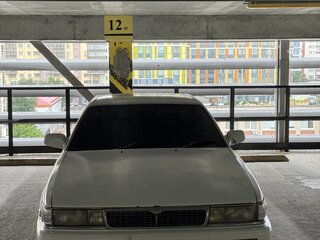 1989 Nissan Laurel VI (C33), белый, 355000 рублей, вид 1