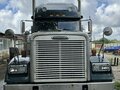 2003 Freightliner FLD, зелёный, 2700000 рублей - вид 1
