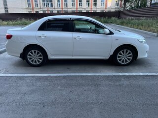 2010 Toyota Corolla X (E140, E150), белый, 1250000 рублей, вид 4
