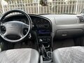 2006 Kia Spectra I Рестайлинг 2, серебристый, 400000 рублей - вид 5