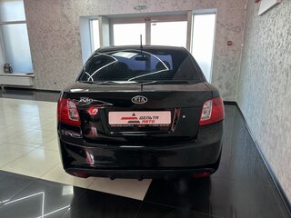 2011 Kia Rio II Рестайлинг, чёрный, 645000 рублей, вид 4