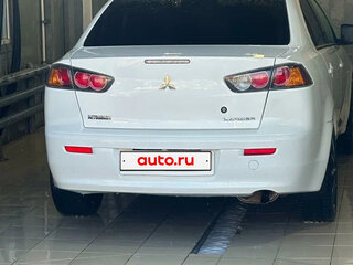 2012 Mitsubishi Lancer X Рестайлинг, белый, 800000 рублей, вид 1