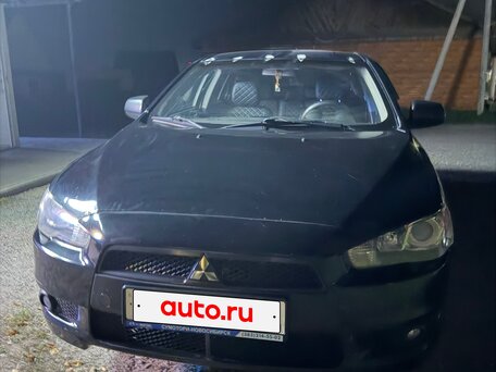 2010 Mitsubishi Lancer X, чёрный, 630000 рублей, вид 2