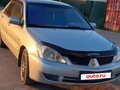 2006 Mitsubishi Lancer IX Рестайлинг, серебристый, 210000 рублей - вид 1