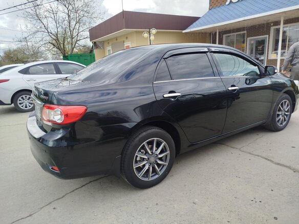2011 Toyota Corolla X (E140, E150) Рестайлинг, чёрный - вид 3