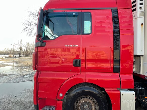 2011 MAN TGX, красный, 2350000 рублей - вид 1