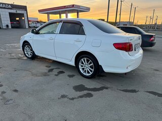 2010 Toyota Corolla X (E140, E150), белый, 780000 рублей, вид 4