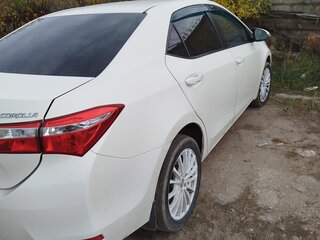 2014 Toyota Corolla XI (E160, E170, E180), белый, 870000 рублей, вид 4