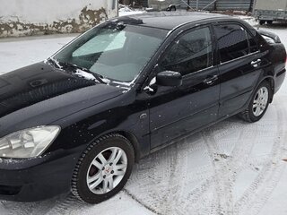 2006 Mitsubishi Lancer IX Рестайлинг, чёрный, 450000 рублей, вид 1