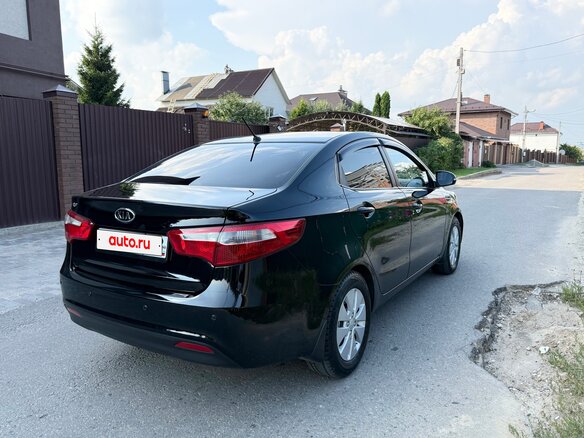 2012 Kia Rio 4-speed III, чёрный - вид 2