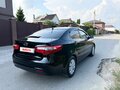 2012 Kia Rio 4-speed III, чёрный - вид 2