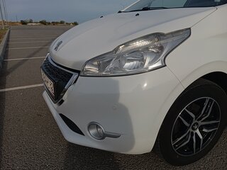 2014 Peugeot 208 I, белый, 695000 рублей, вид 3