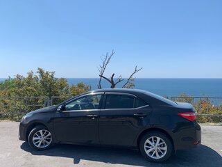 2014 Toyota Corolla XI (E160, E170, E180), чёрный, 1299999 рублей, вид 1