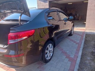 2015 Kia Rio III Рестайлинг, коричневый, 960000 рублей, вид 5