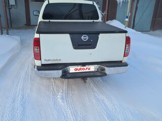 2007 Nissan Navara (Frontier) III (D40), белый, 1000000 рублей, вид 2
