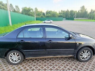 2003 Toyota Corolla IX (E120, E130), чёрный, 295000 рублей, вид 4