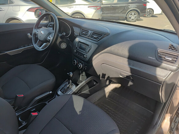 2014 Kia Rio 6-speed III, коричневый, 825000 рублей - вид 10
