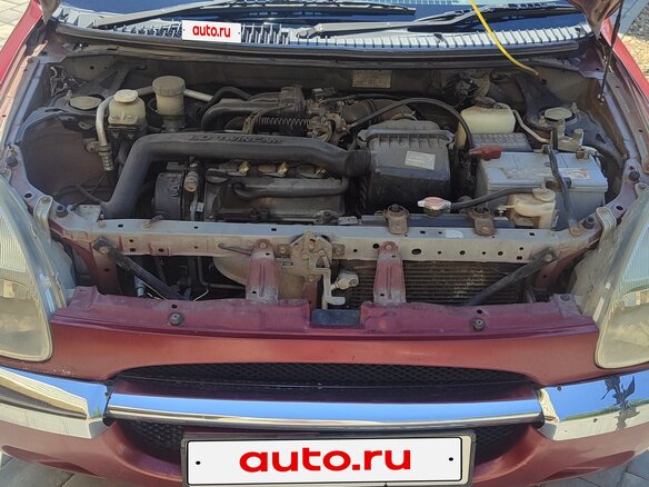 1999 Toyota Duet, красный, 200000 рублей - вид 9
