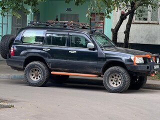 2003 Toyota Land Cruiser 105 100 Series Рестайлинг 1, чёрный, 1600000 рублей, вид 2
