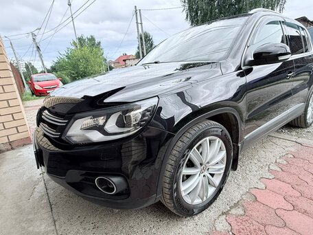 2014 Volkswagen Tiguan I Рестайлинг, чёрный, 1650000 рублей, вид 1