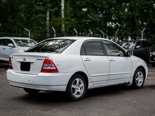 2002 Toyota Corolla IX (E120, E130), белый, 450000 рублей, вид 2