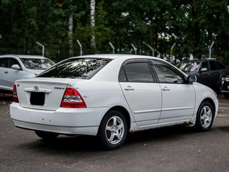 2002 Toyota Corolla IX (E120, E130), белый, 380000 рублей, вид 2