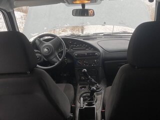2011 Chevrolet Niva I Рестайлинг, серый, 646000 рублей, вид 3