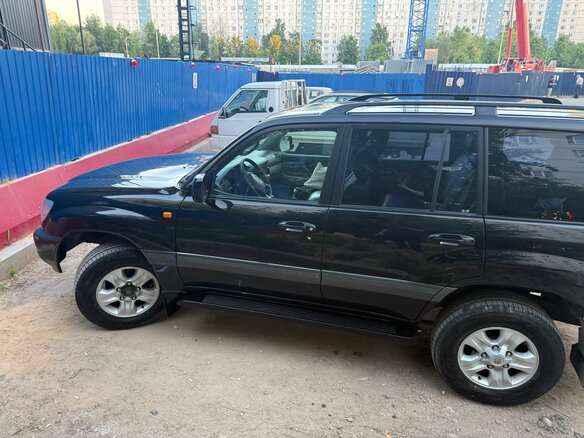 2002 Toyota Land Cruiser 100 Series, чёрный - вид 3
