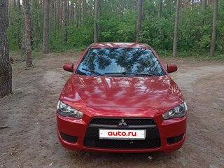 2009 Mitsubishi Lancer X, красный, 650000 рублей, вид 4