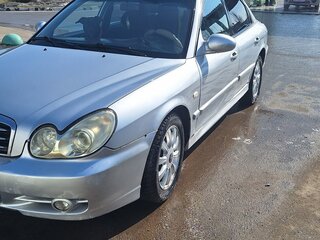 2005 Hyundai Sonata ТагАЗ IV (EF) Рестайлинг, серебристый, 200000 рублей, вид 1
