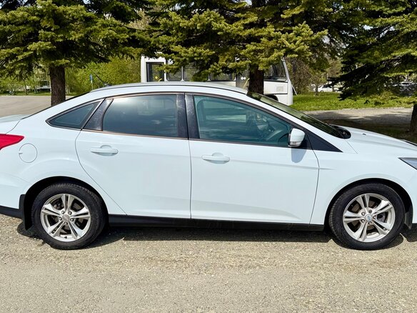 2015 Ford Focus III Рестайлинг, белый - вид 3