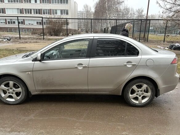 2013 Mitsubishi Lancer X Рестайлинг, серебристый, 799900 рублей - вид 2