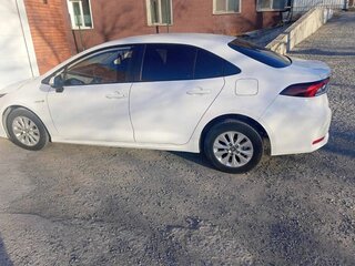 2019 Toyota Corolla Sporty XII (E210), белый, 2150000 рублей, вид 2