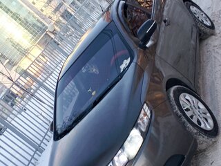 2010 Kia Cerato 6-speed II, коричневый, 660000 рублей, вид 2