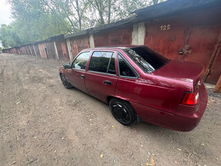 2010 Daewoo Nexia I Рестайлинг, пурпурный, 270000 рублей, вид 2