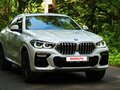 2021 BMW X6 40d III (G06), белый, 8500000 рублей - вид 1