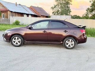 2010 Kia Cerato 6-speed II, красный, 600000 рублей, вид 5